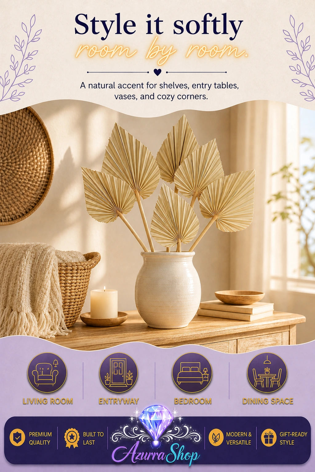 Dried palm fan leaves in a cream ceramic vase on a wooden console table styled with a woven basket, cream knit throw, lit candle, and books