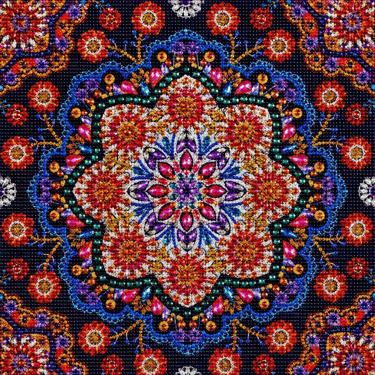 Finished crimson jeweled flower mandala diamond painting with a red and blue floral medallion surrounded by scattered flowers on navy | Azurra Shop