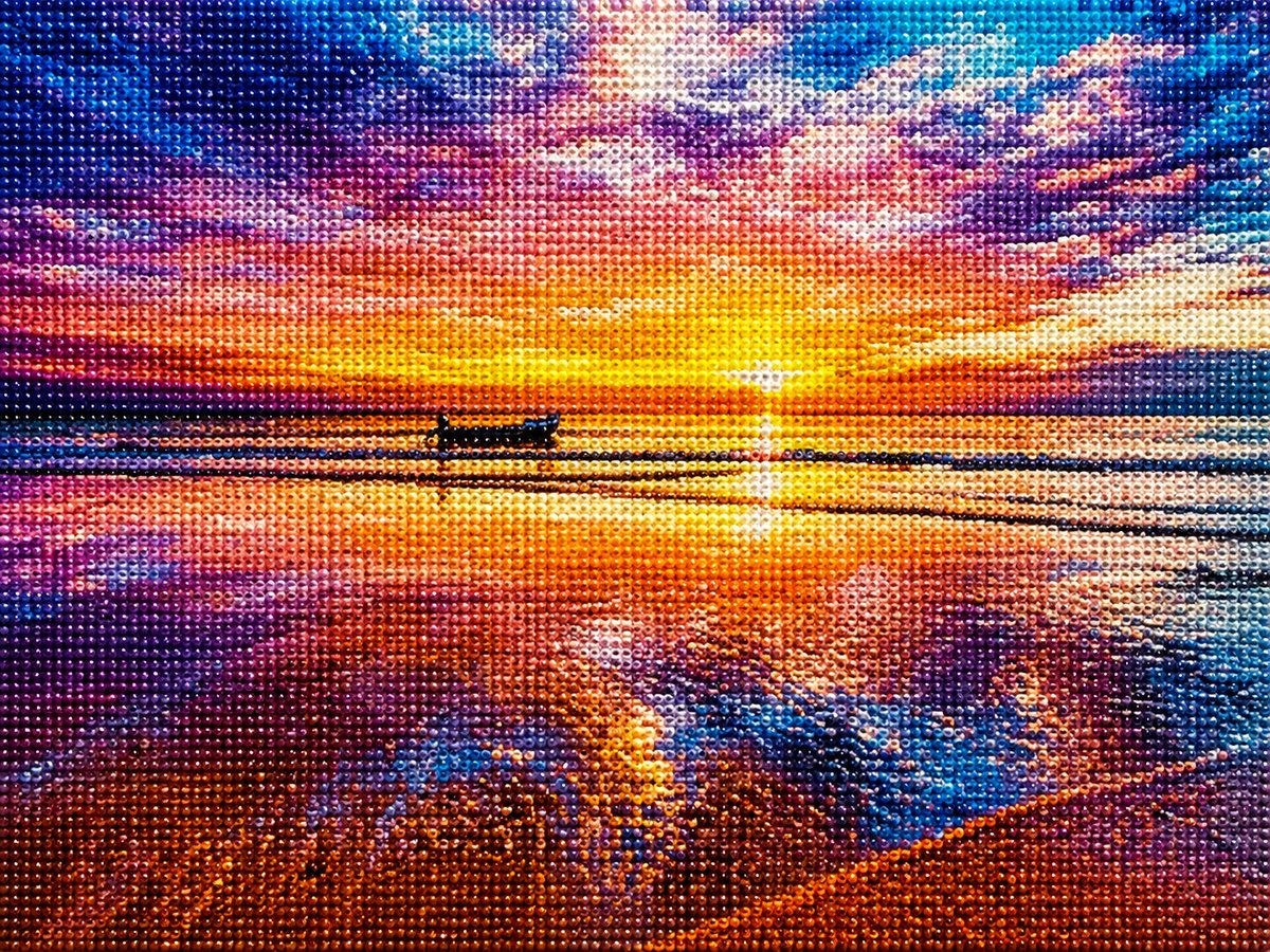 Close up of the finished ocean sunset with a lone boat diamond painting with sparkling drills | Azurra Shop