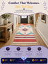 Hand woven cotton linen runner rug in a red, teal, and cream geometric diamond pattern, shown in a hallway entryway (Huayan colorway)