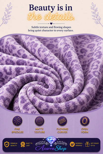 Close-up of the lavender leopard print texture on the plush fleece blanket, with an Azurra Shop promotional banner
