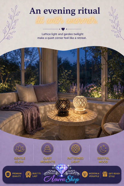 A promotional graphic showing a cozy patio lounge at dusk with two glowing decorative lattice lamps, one black and one white, on a round wooden table. The top text reads "An evening ritual lit with warmth."