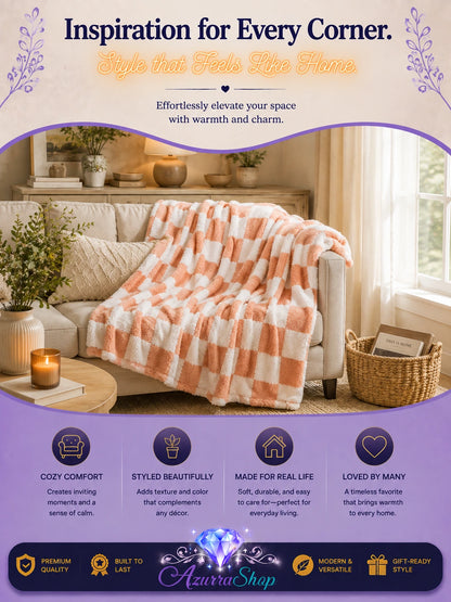 Pink and white checkerboard fleece throw blanket draped over a beige sofa in a living room, with an Azurra Shop promotional banner