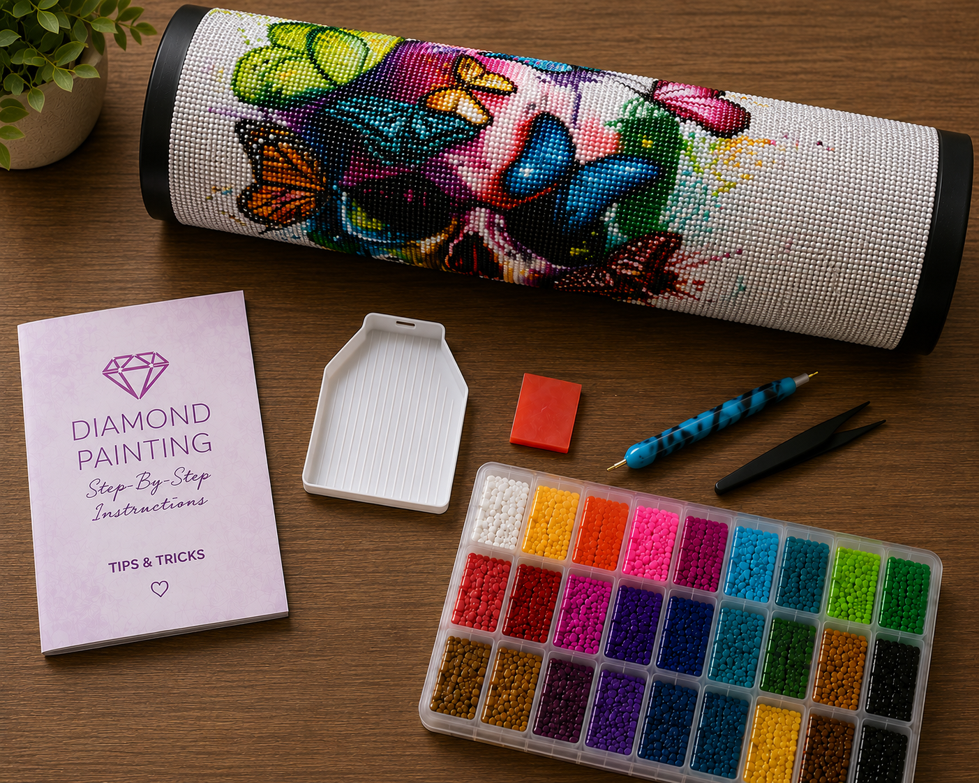 Colorful Butterfly Skull Diamond Painting Kit – flat lay of kit contents including rolled canvas, 24-color diamond drill container, grooved sorting tray, wax pad, applicator pen, tweezers, and step-by-step instruction booklet with tips and tricks
