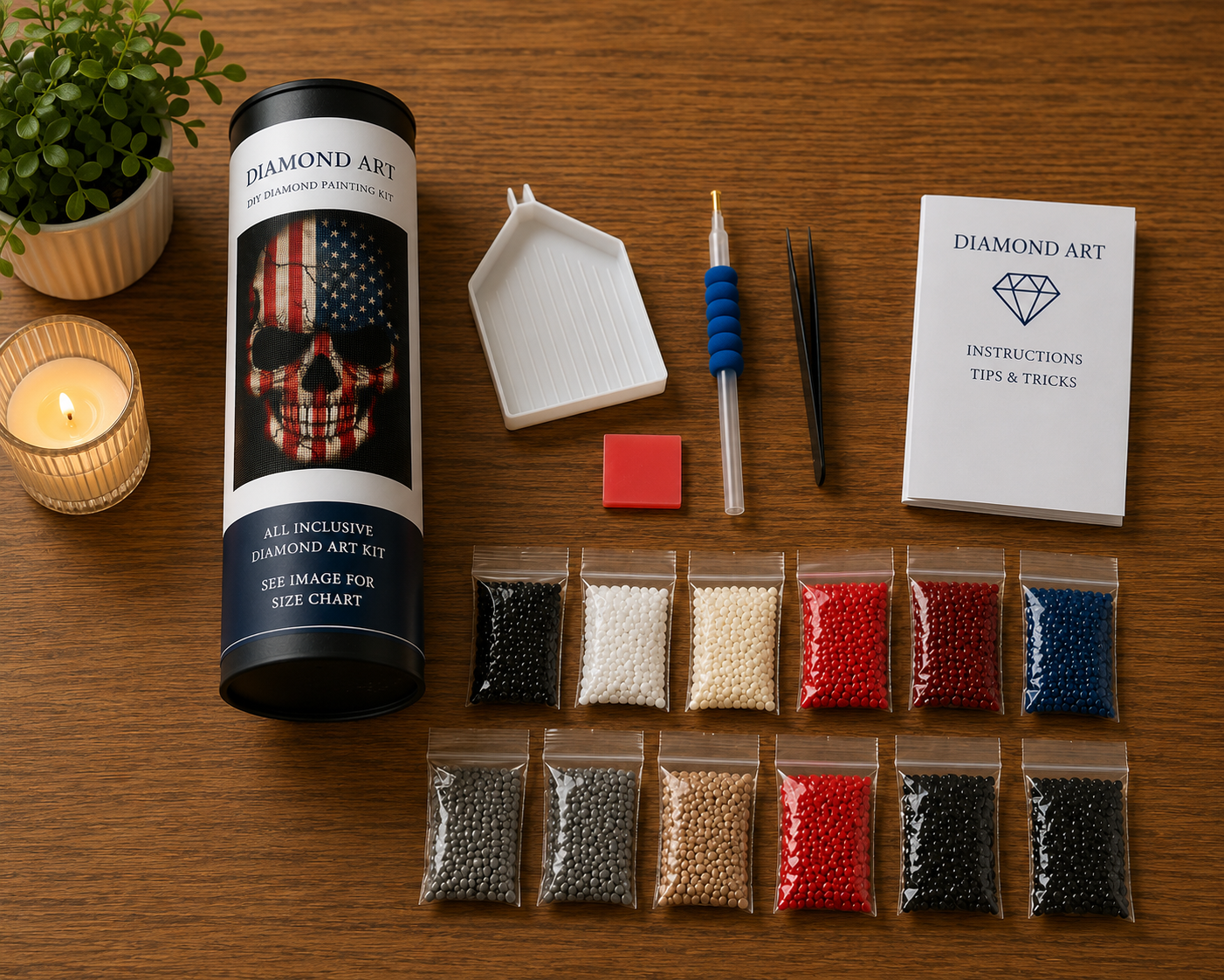 Stars &amp; Stripes Skull Diamond Painting Kit – flat lay on warm wood surface showing canvas rolled in a Diamond Art tube labeled "All Inclusive Diamond Art Kit", 12 resealable diamond drill bags in black, white, cream, red, and navy blue, white grooved sorting tray, blue applicator pen, black tweezers, red wax pad, and Diamond Art instructions booklet beside a glowing candle and trailing plant
