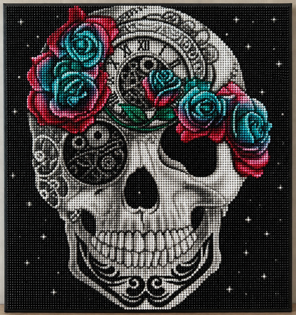 Steampunk Rose Crown Skull Diamond Painting Kit – completed 5D diamond art close-up featuring a detailed white sugar skull with intricate black filigree patterns, a Roman numeral clock face on the forehead, and a lush crown of teal and red roses on a black starry background
