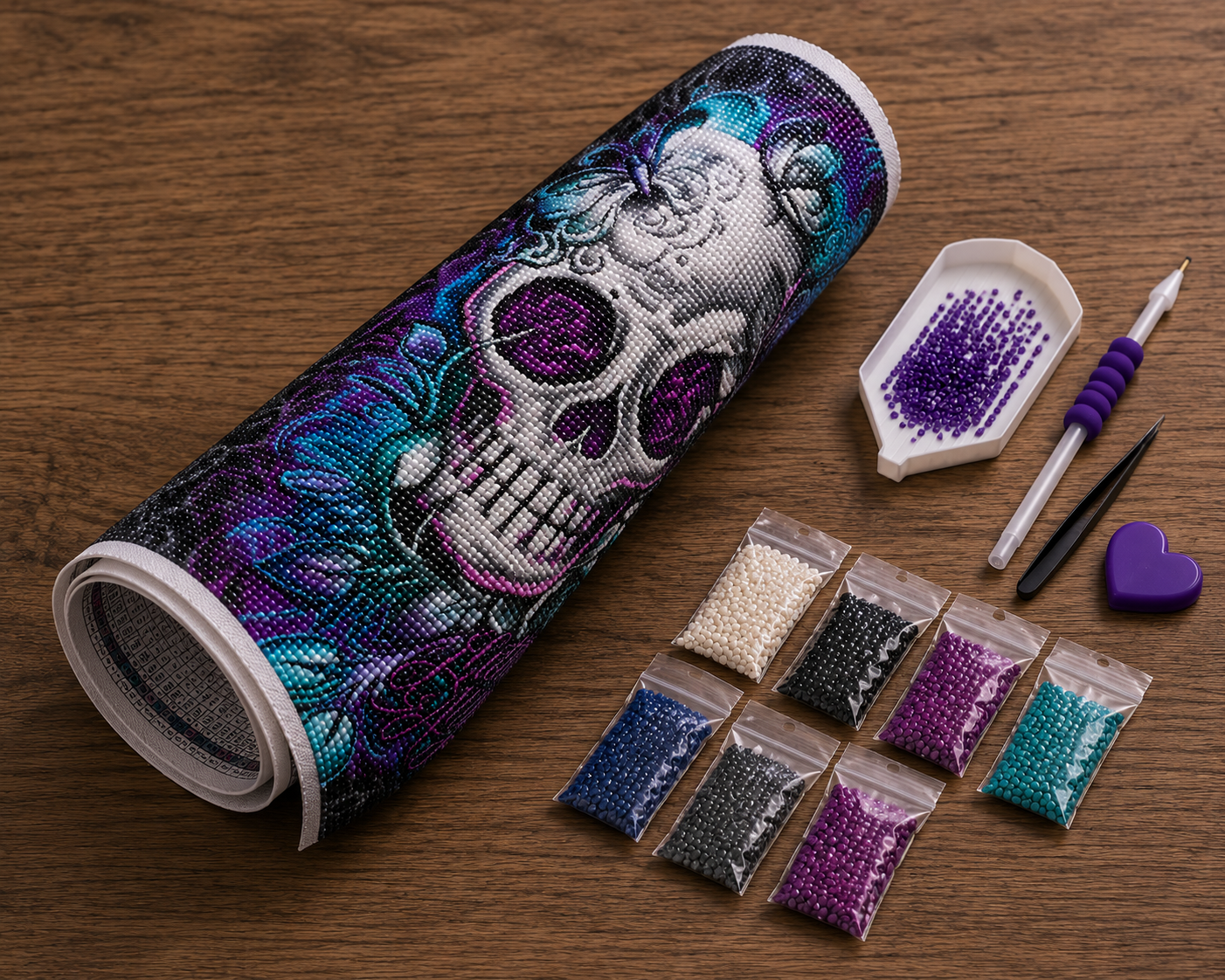 Teal Butterfly Sugar Skull with Rose Eyes Diamond Painting Kit – flat lay on wood surface showing rolled sugar skull canvas, 8 resealable diamond drill bags in white, black, navy, dark gray, purple, teal, and violet tones, grooved sorting tray with purple drills, purple applicator pen, black tweezers, and purple heart wax pad
