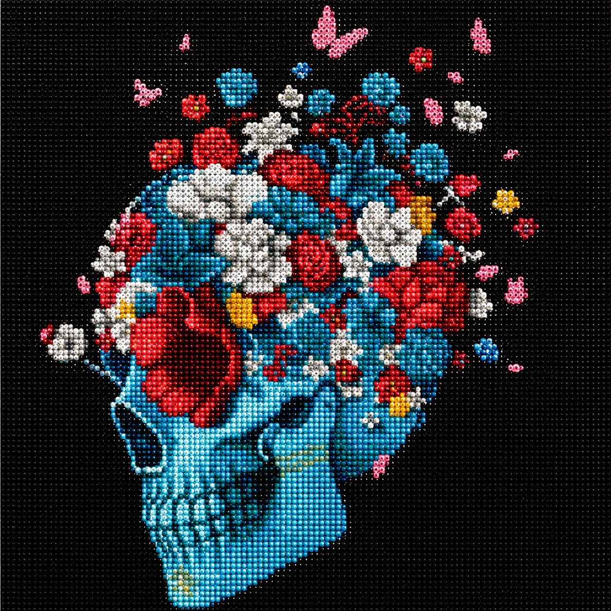 Teal Skull &amp; Flower Crown Diamond Painting Kit – completed diamond art featuring a teal skull crowned with red, white, and yellow flowers with pink butterflies on a black background
