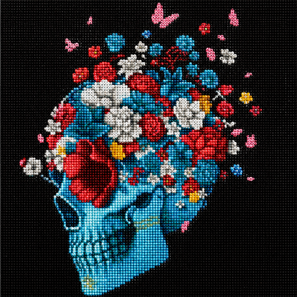 Teal Skull &amp; Flower Crown Diamond Painting Kit – completed diamond art featuring a teal skull crowned with red, white, and yellow flowers with pink butterflies on a black background
