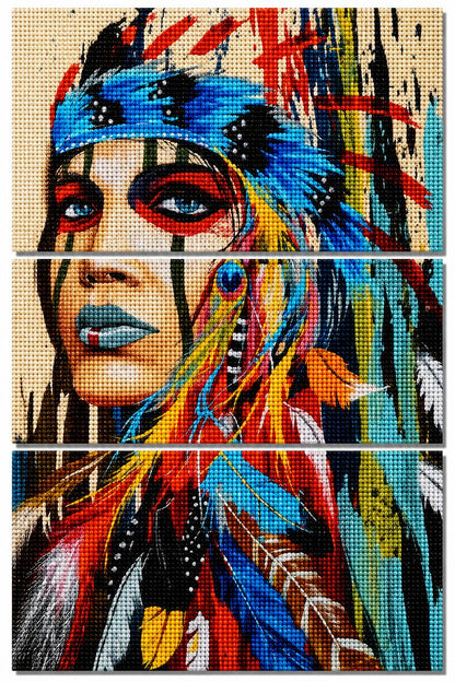 Finished three panel diamond painting of a Native American woman in a blue feather headdress with red war paint and colorful feathers | Azurra Shop