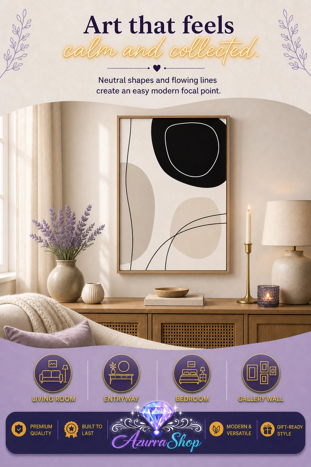 Framed abstract canvas print with black and beige organic shapes displayed in a living room, hung above a wooden console table with a lavender vase, a lit candle, and a table lamp, next to a cream sofa with pillows