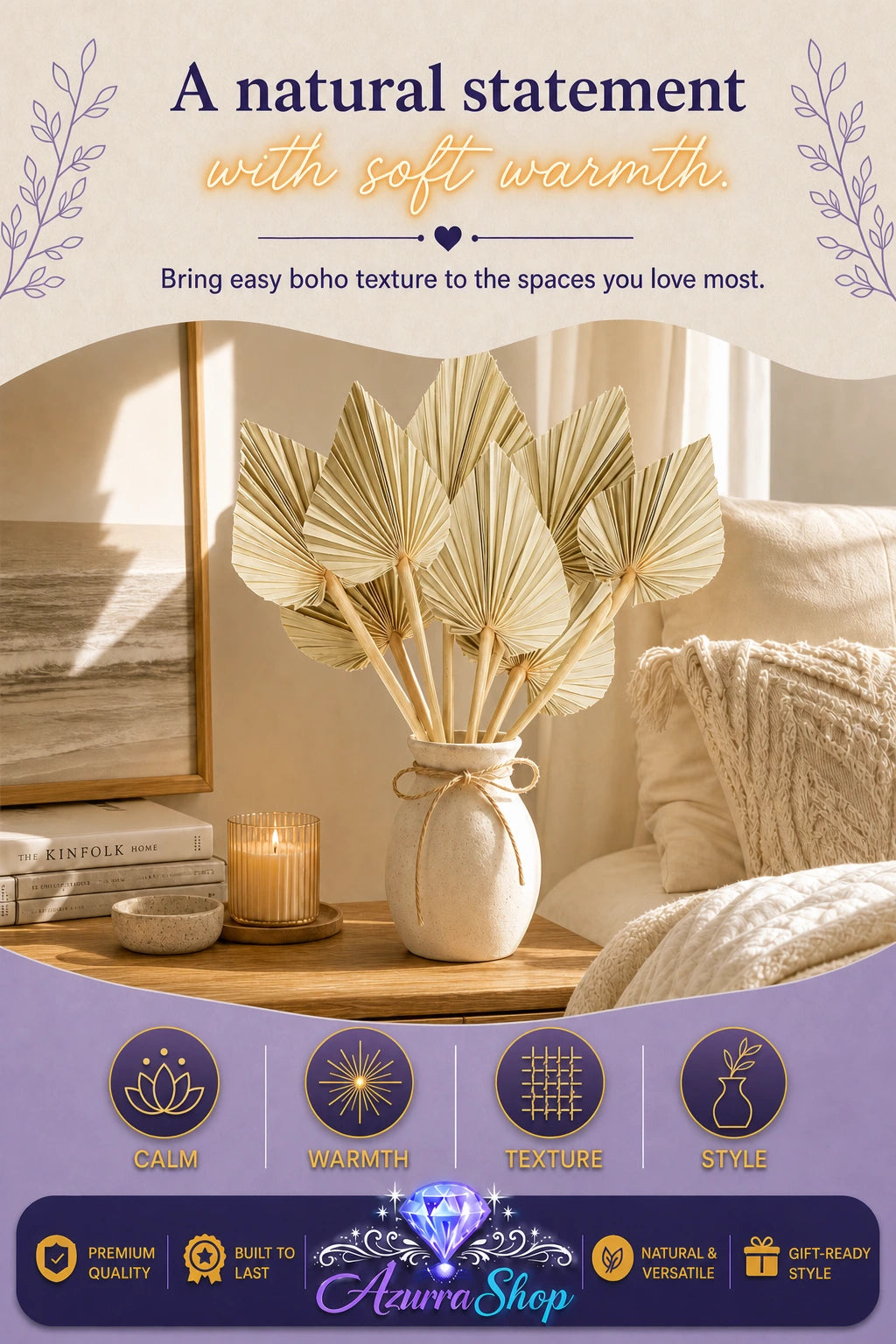 Dried palm fan leaves tied with twine in a speckled cream vase on a wooden nightstand next to a lit candle, ocean art print, and a knit throw