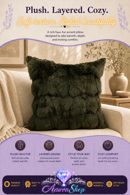Dark olive green faux-fur throw pillow with folded texture, styled on a beige armchair; promotional text reads "Plush. Layered. Cozy."