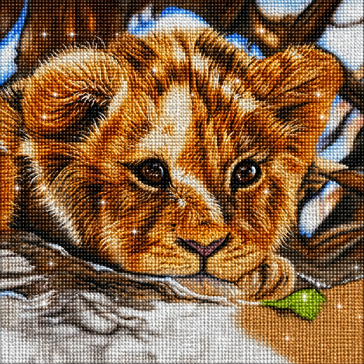Baby lion cub diamond painting kit close-up – fluffy golden lion cub resting chin on a branch with soulful dark eyes, warm golden brown and cream fur, bright blue sky background, sparkling full drill 5D resin diamond texture — Azurra Shop

