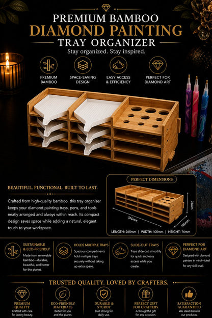 Bamboo tray organizer with colored drill pens standing in the built in pen holder, next to a diamond painting