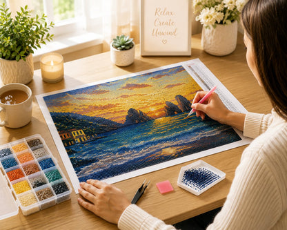 Working on the Mediterranean sea stack sunset kit at a cozy desk with drill tools nearby | Azurra Shop