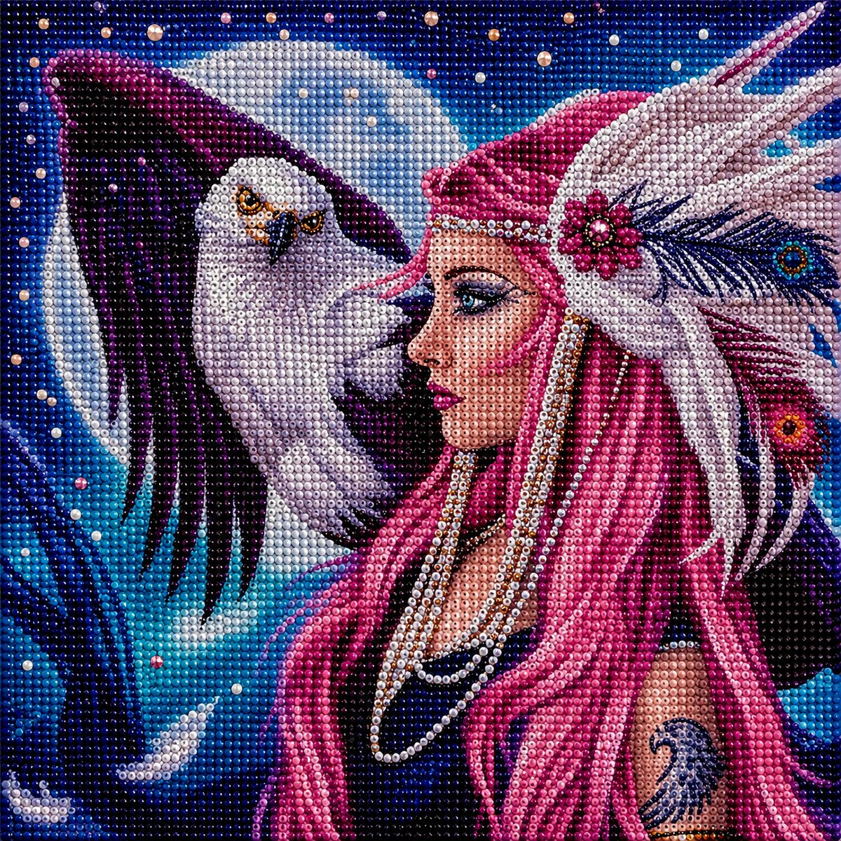 Finished diamond painting of a pink haired woman in a feather headdress face to face with a bald eagle under a full moon | Azurra Shop