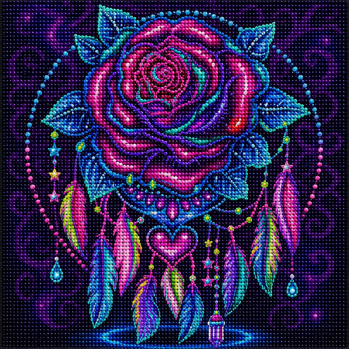 Finished rose dreamcatcher diamond painting with a magenta and teal rose, hanging feathers, and a beaded heart on deep purple | Azurra Shop