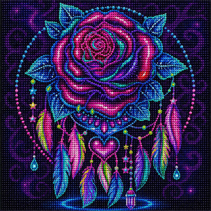 Finished rose dreamcatcher diamond painting with a magenta and teal rose, hanging feathers, and a beaded heart on deep purple | Azurra Shop
