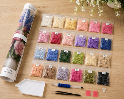 Diamond painting kit supplies including rolled canvas, 24 numbered diamond bags, tray, pen, and tweezers | Azurra Shop