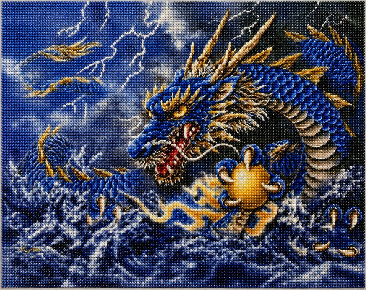 Finished Chinese dragon diamond painting with a blue and gold dragon holding a glowing pearl amid lightning and crashing waves | Azurra Shop