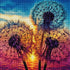 Finished dandelion rainbow sunset diamond painting with three dandelion seed heads glowing against an orange and pink sunset sky | Azurra Shop