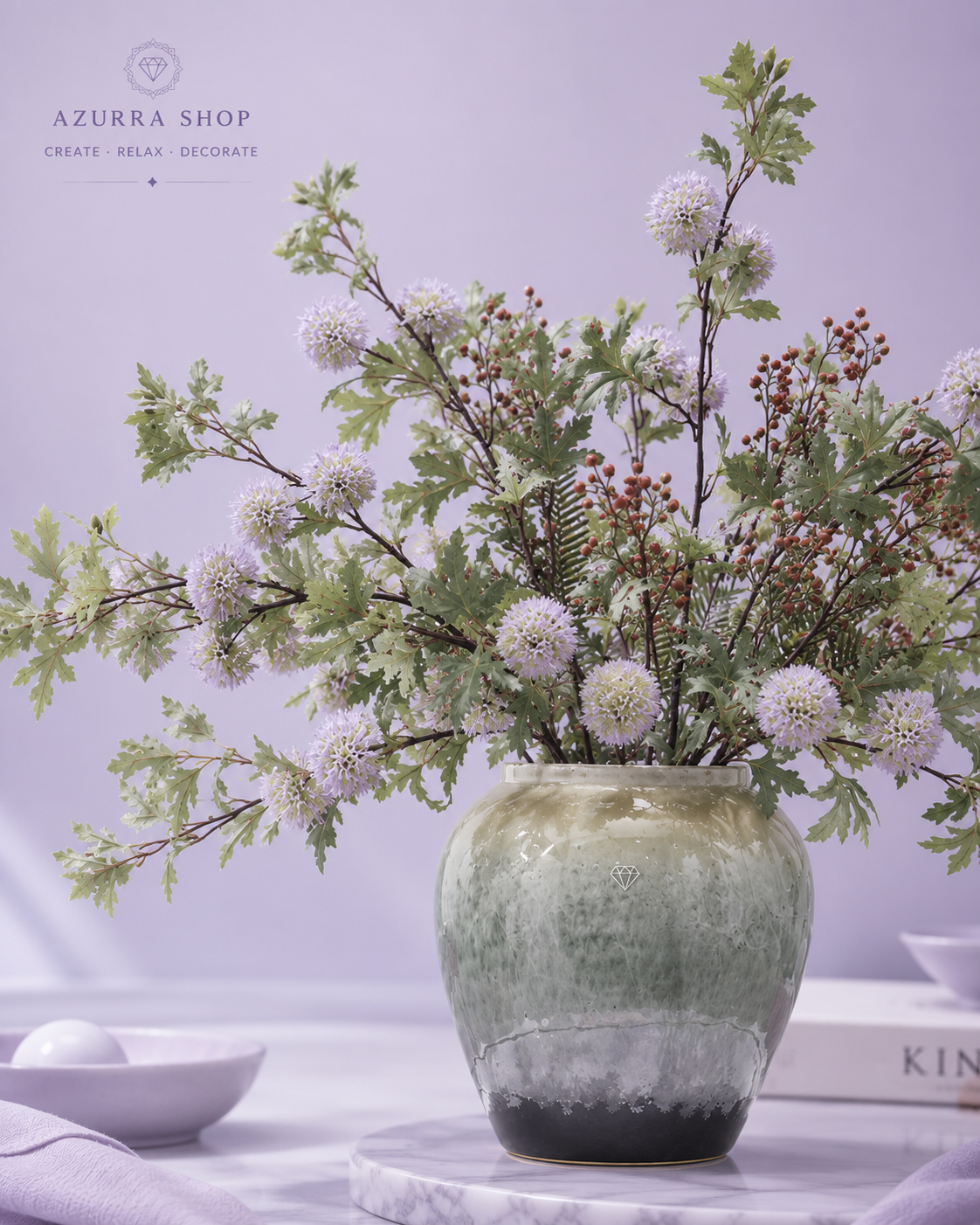 Close-up of dandelion globe blooms and foxtail branches in glazed green ceramic vase — Azurra Shop
