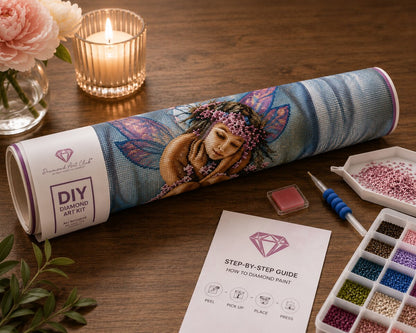 Diamond painting kit supplies including rolled canvas, sorted diamond tray, applicator pen, and step by step guide | Azurra Shop