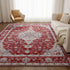 Close-up of vintage distressed tribal pattern faux wool rug — low pile non-shedding floor carpet — Azurra Shop