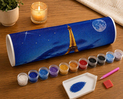 Rolled canvas and full supplies for the Eiffel Tower kit, including diamond packets, applicator pen, and tray | Azurra Shop