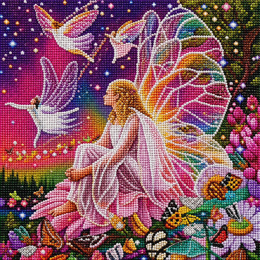 Finished enchanted fairy diamond painting with a golden haired fairy in a white gown and rainbow butterfly wings under a starlit purple and pink sky | Azurra Shop