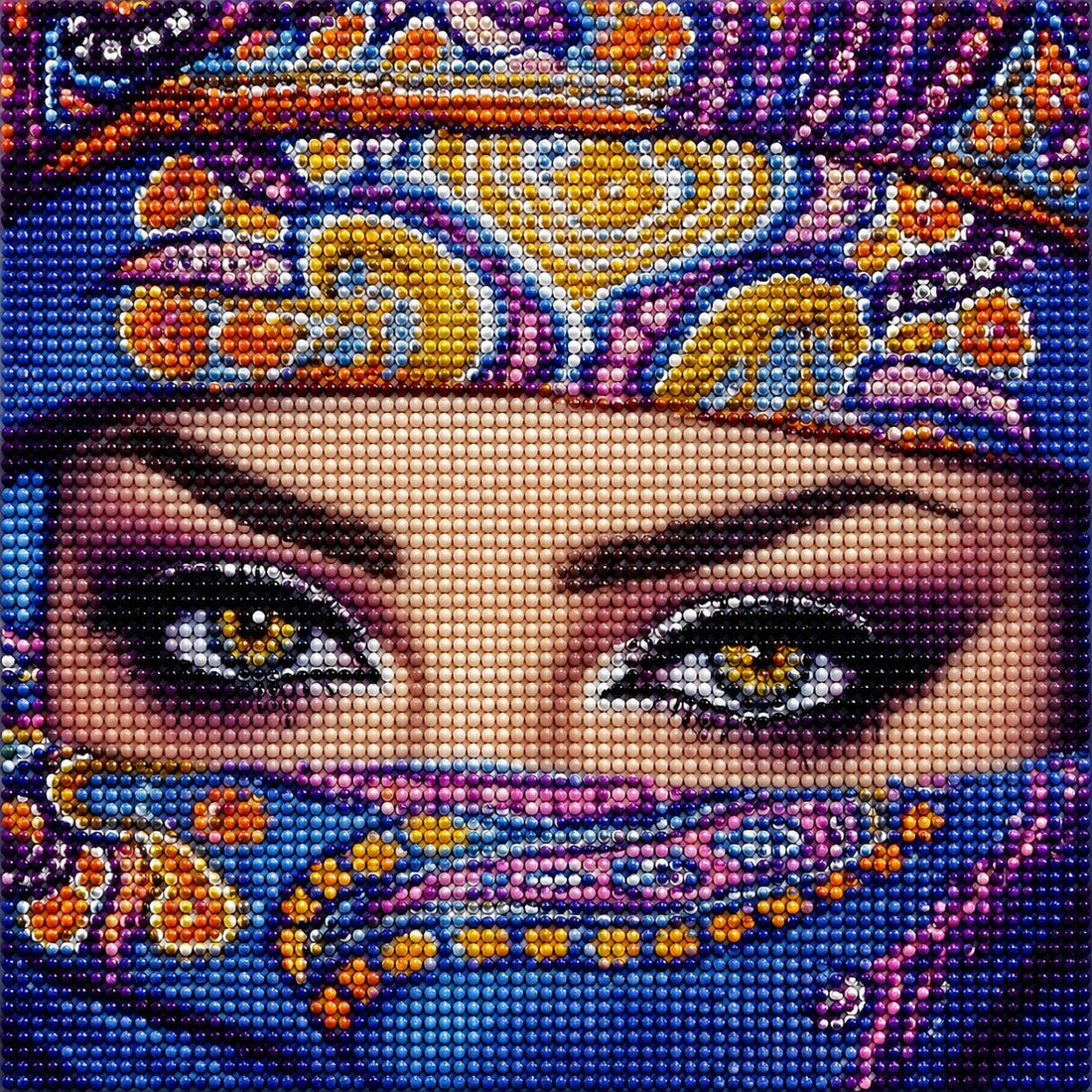 Close up of the finished eye diamond painting showing a woman&