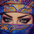 Close up of the finished eye diamond painting showing a woman&