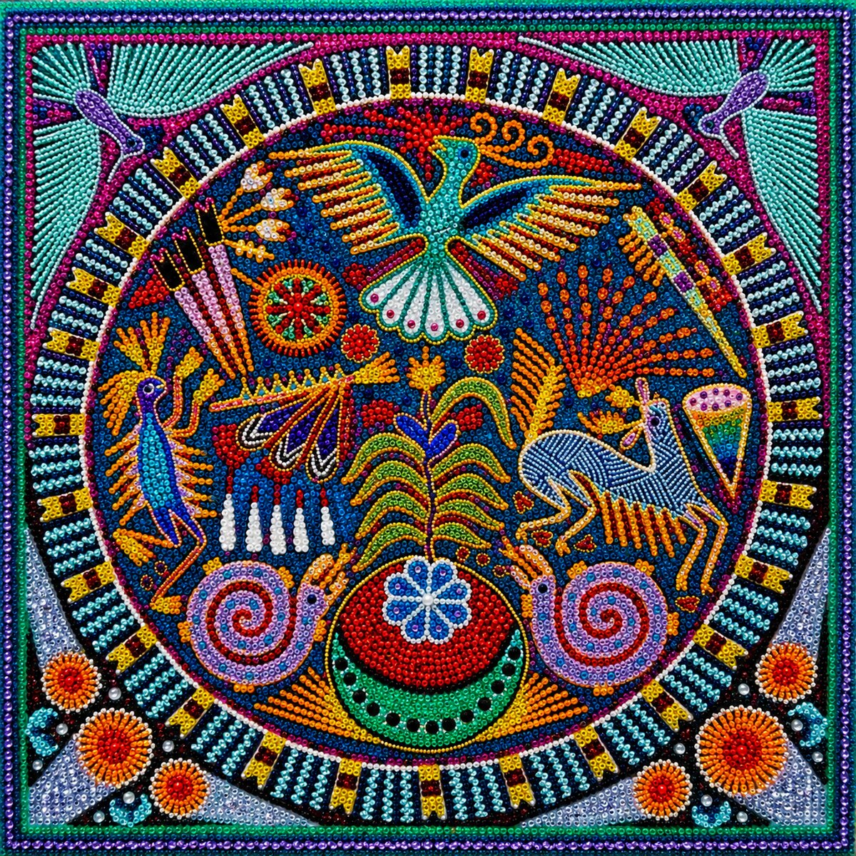 Finished Huichol folk art mandala diamond painting with a hummingbird, deer, peacock, and snails in a circular design on blue | Azurra Shop