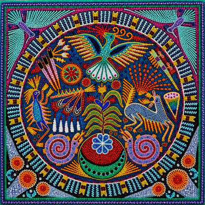 Finished Huichol folk art mandala diamond painting with a hummingbird, deer, peacock, and snails in a circular design on blue | Azurra Shop