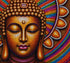 Close up of the finished golden Buddha diamond painting, with closed eyes and a colorful mandala halo