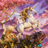 Finished golden mane unicorn diamond painting with a rearing unicorn under a pink cherry blossom tree against a purple sunset sky | Azurra Shop