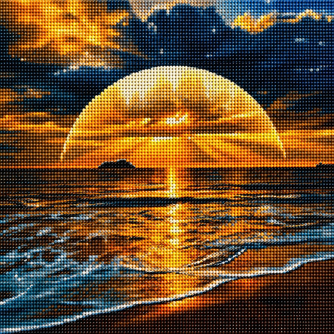 Finished golden moon rising over the sea diamond painting with a glowing golden moon reflecting on ocean waves at dusk | Azurra Shop