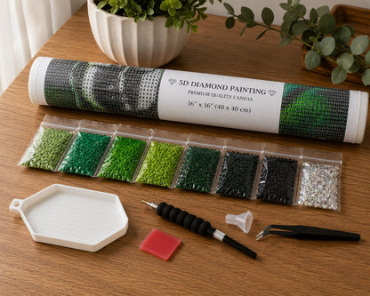 Rolled canvas and full supplies for the dark Buddha kit, including drill trays, applicator pen, and tweezers