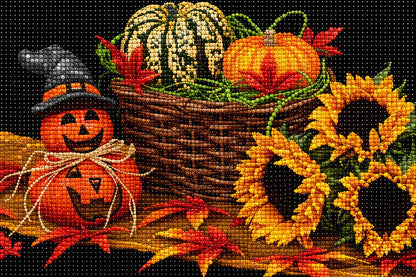 Close up of the finished harvest diamond painting with a jack o lantern, a basket of gourds, and sunflowers | Azurra Shop