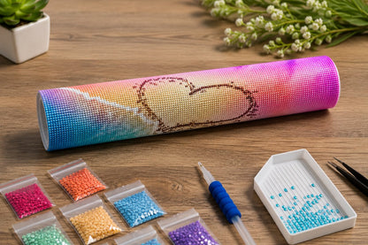 Rolled canvas and full supplies for the rainbow heart in the sand kit, including diamond packets, pen, and tweezers | Azurra Shop
