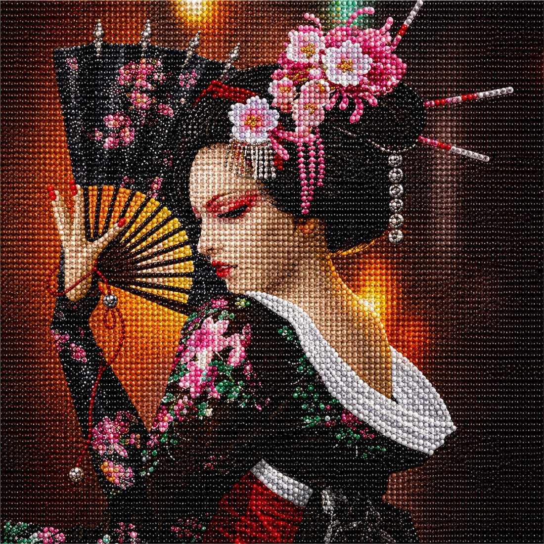 Close up of the finished Japanese geisha diamond painting holding a fan with cherry blossoms in her hair | Azurra Shop