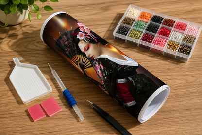 Rolled canvas and full supplies for the Japanese geisha kit, including diamond trays, applicator pen, and tweezers | Azurra Shop