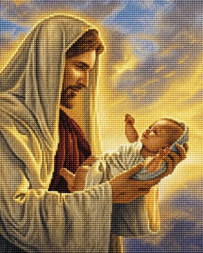 Close up of the finished diamond painting of Jesus holding a newborn baby, in warm golden light