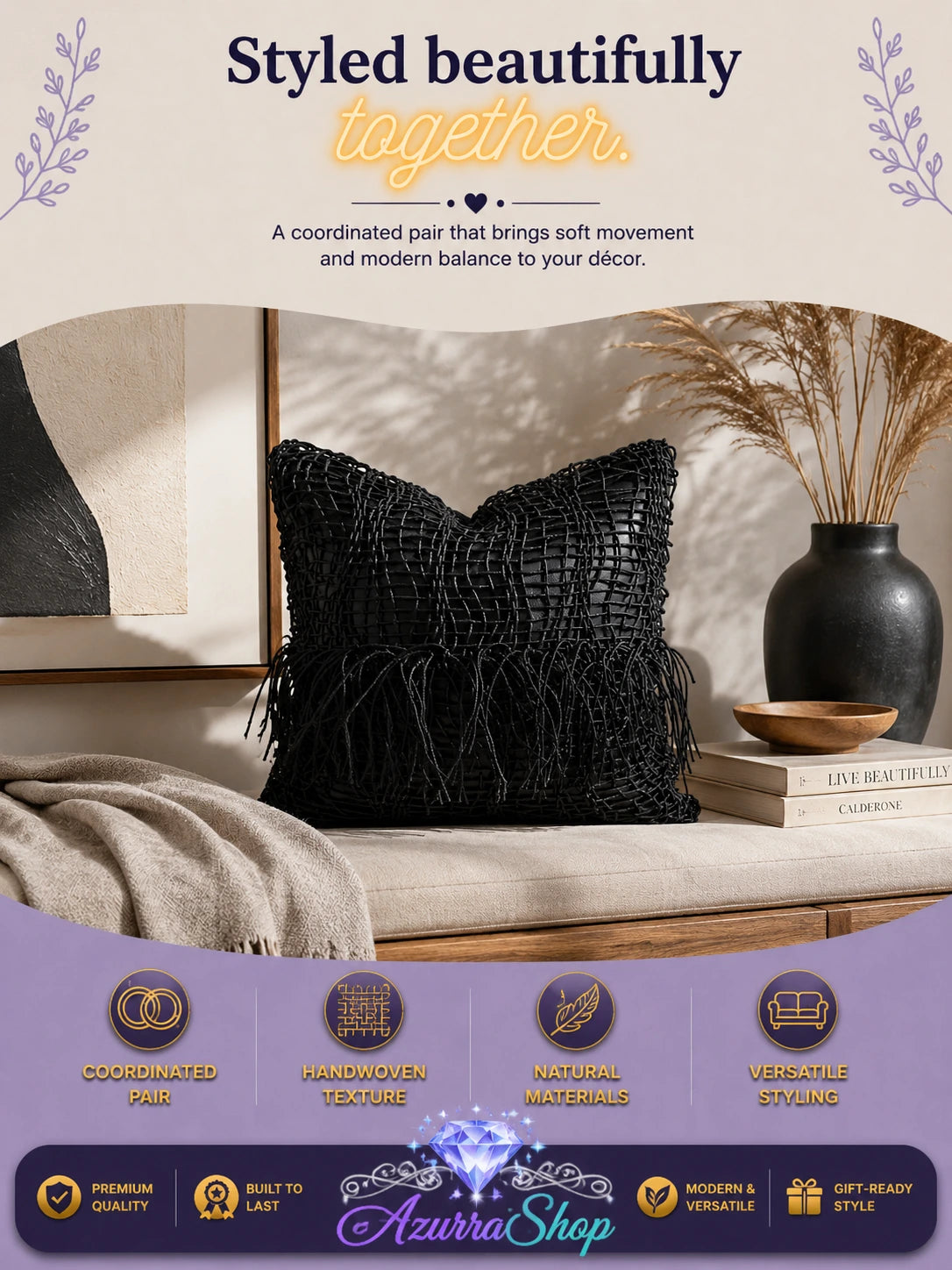 Black woven throw pillow with fringe styled on a bench with a vase and dried grass