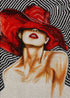 Close up of the finished lady in red hat diamond painting with bold red lips and a swirling black and white background | Azurra Shop
