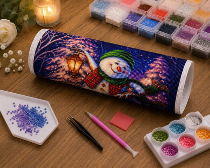 Rolled canvas and full supplies for the lantern snowman kit, including diamond trays, applicator pen, and tweezers | Azurra Shop