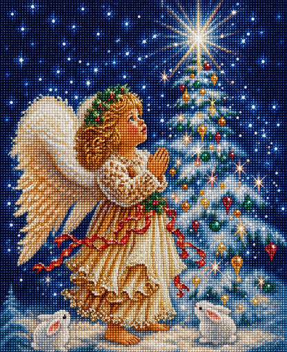 Close up of the finished praying angel child diamond painting, kneeling before a glowing Christmas tree with white bunnies at her feet