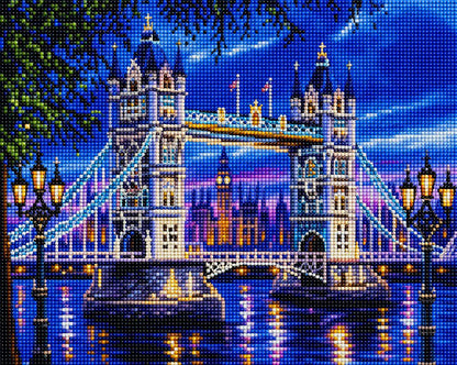 Finished London Tower Bridge diamond painting kit artwork with the bridge lit up at dusk and reflections on the Thames | Azurra Shop