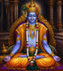Close up of the finished Lord Krishna diamond painting, seated in meditation on a golden throne with a peacock feather crown